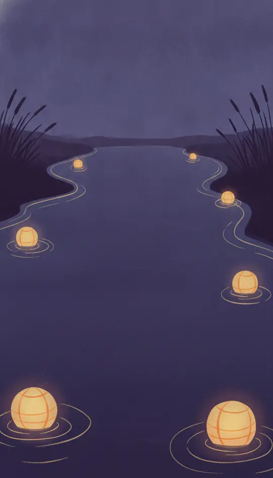 Floating lanterns on a night river